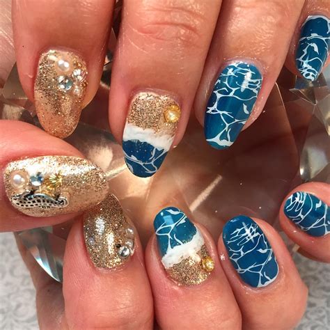 Sea Witch Style: Beachy Nail Designs with a Magical Touch